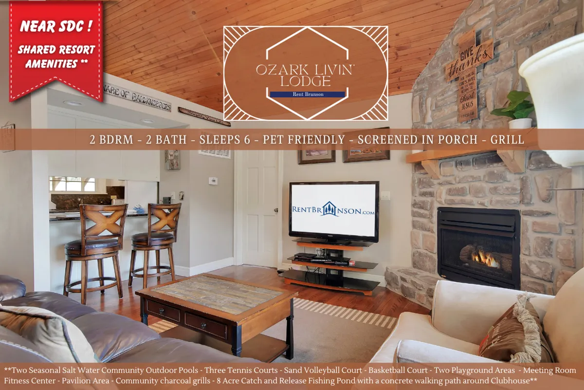 An inviting interior view with a fireplace, a comfortable seating area, a TV, and a dining table. The space is arranged for both relaxation and togetherness, ideal for family game nights or movie evenings.